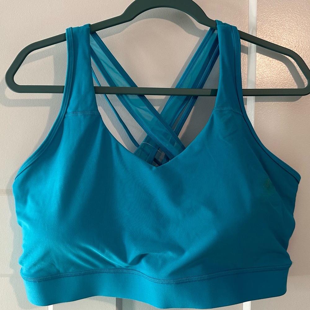 Brand New With Tags sports bra (Minor stain will come out in the wash!)